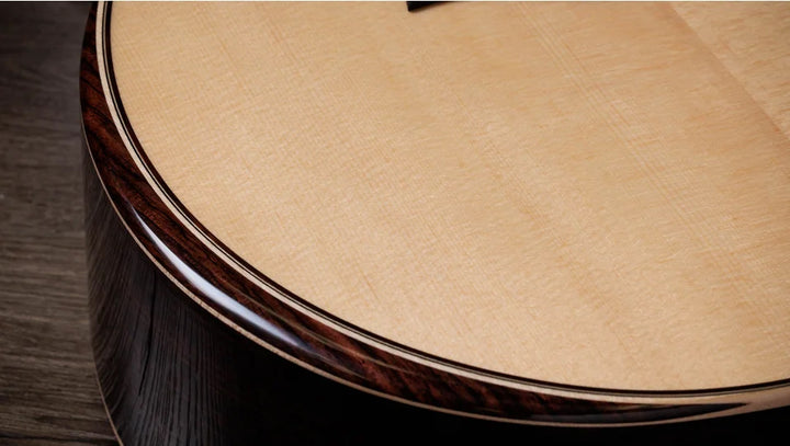 Overview

Indian rosewood body produces rich overtone character
Sitka spruce top for clarity and power
Versatile, all-purpose Grand Auditorium body shape
V-Class bracing adds more volume and sustain
Includes Claria electronics and hardshell case