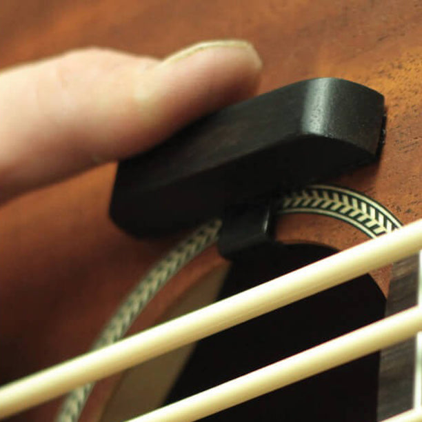 Designed by Gold Tone especially for MicroBasses, the MBTR features a spring clip for quick mounting on the upper edge of the sound hole and can be positioned at different angles. Made of rosewood to match the M-bass fretboard, it can be used on any acoustic bass that has at least one inch of distance from the edge of the sound hole to any interior brace.