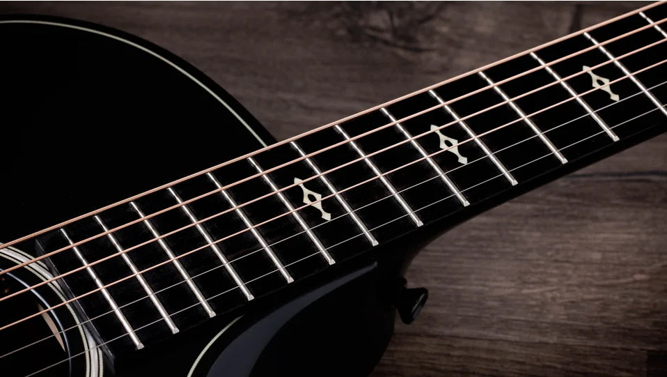 Overview

Solid sapele back and sides yield bold midrange voice
Mahogany top for warm, woody character
Scalloped V-Class bracing dramatically improves volume and sustain
Beveled armrest and cutaway offer seamless feel
Ships with Claria electronics and hardshell case