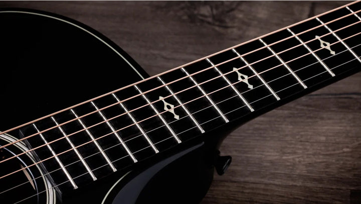 Overview

Solid sapele back and sides yield bold midrange voice
Mahogany top for warm, woody character
Scalloped V-Class bracing dramatically improves volume and sustain
Beveled armrest and cutaway offer seamless feel
Ships with Claria electronics and hardshell case