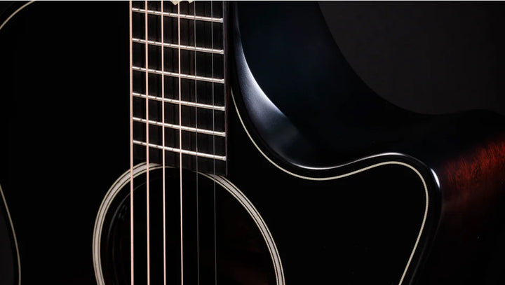 Overview

Solid sapele back and sides yield bold midrange voice
Mahogany top for warm, woody character
Scalloped V-Class bracing dramatically improves volume and sustain
Beveled armrest and cutaway offer seamless feel
Ships with Claria electronics and hardshell case