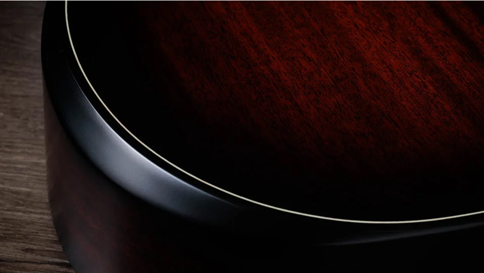 Overview

Solid sapele back and sides yield bold midrange voice
Mahogany top for warm, woody character
Scalloped V-Class bracing dramatically improves volume and sustain
Beveled armrest and cutaway offer seamless feel
Ships with Claria electronics and hardshell case