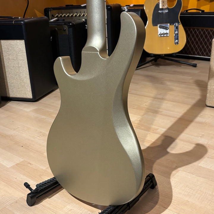 Gibson Victory, Gold Mist Satin. Reintroduced 80s-era cult-favorite solidbody electric. Mahogany body with refined contours. Explorer headstock. 25.5-inch scale SlimTaper mahogany neck, compound radius ebony fretboard, 24 medium jumbo frets. 80s Tribute humbuckers with push/pull master volume and tone controls for coil splitting. Tune-O-Matic bridge, Stop Bar tailpiece. Satin nitrocellulose lacquer finish. Includes hardshell case.