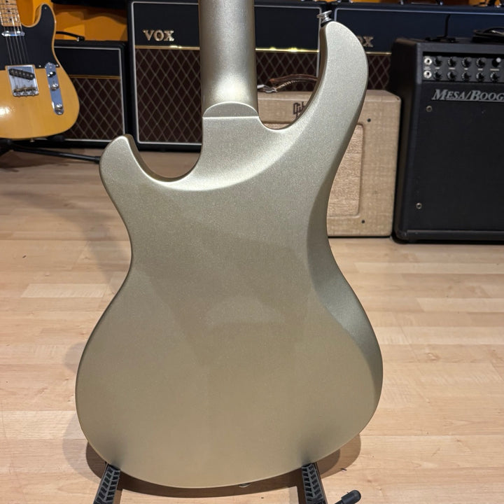 Gibson Victory, Gold Mist Satin. Reintroduced 80s-era cult-favorite solidbody electric. Mahogany body with refined contours. Explorer headstock. 25.5-inch scale SlimTaper mahogany neck, compound radius ebony fretboard, 24 medium jumbo frets. 80s Tribute humbuckers with push/pull master volume and tone controls for coil splitting. Tune-O-Matic bridge, Stop Bar tailpiece. Satin nitrocellulose lacquer finish. Includes hardshell case.