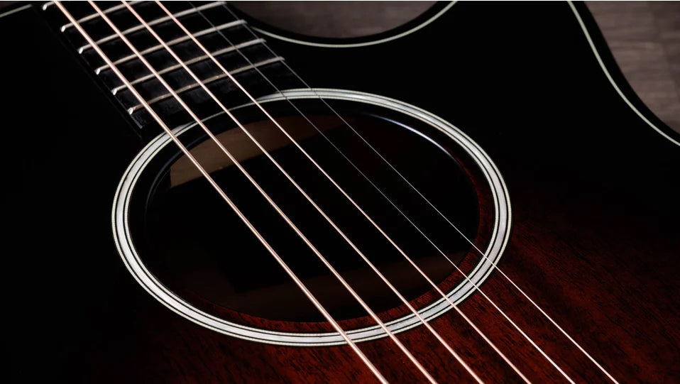 Overview

Solid sapele back and sides yield bold midrange voice
Mahogany top for warm, woody character
Scalloped V-Class bracing dramatically improves volume and sustain
Beveled armrest and cutaway offer seamless feel
Ships with Claria electronics and hardshell case