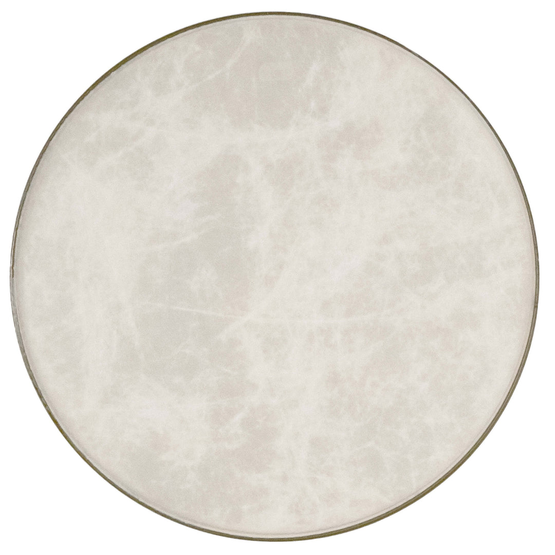 The Fiberskyn Banjo Head embodies the look and sound of the old calfskin head with maintenance-free convenience. This head has a warm, round tone and described as a "plunky" or Appalachian "old time" kind of sound. The sustain is short, similar to coated banjo heads but with more low end response. Remo synthetic film banjo heads are trusted by every major banjo manufacturer worldwide due to their quality of construction, sound and performance.