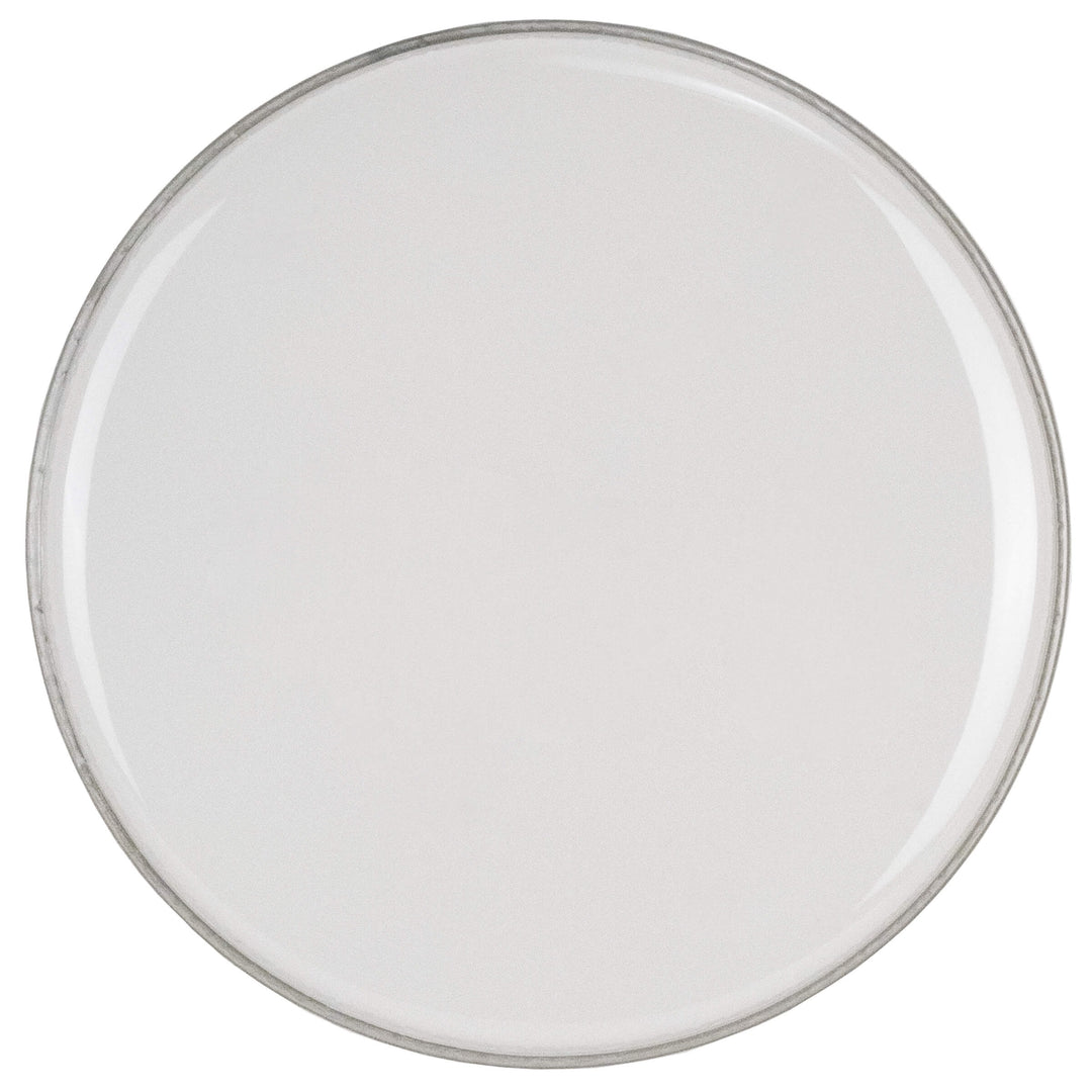 The Coated Bottom Banjo Head has the traditional white look with a similar sound to a top-coated head but puts the coating on the underside of the head. The smooth top surface is preferred by tenor and plectrum banjoists because it is quieter when strumming. Remo banjo heads are trusted by every major banjo manufacturer worldwide due to their quality of construction, sound and performance. They come in three collar heights: Low Collar - 3/8", Medium Collar - 7/16", and High Collar - 1/2".
