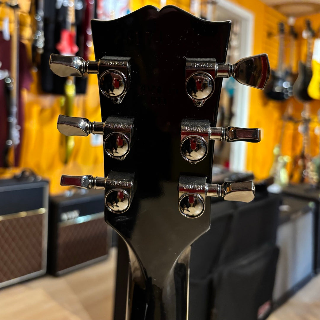 Gibson Les Paul Studio Modern. Ultra Modern weight-relieved mahogany body with maple cap. Modern Contoured Heel for exceptional upper-fret access. Mahogany neck with rounded profile. Compound radius bound ebony fretboard. 490R and 498T pickups with coil tapping, phase switching, and pure bypass. Black nickel hardware. Includes soft shell case.