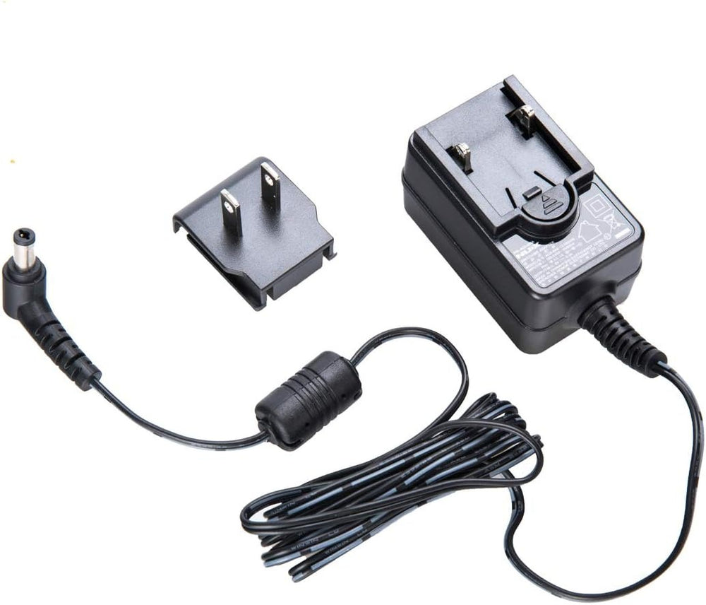 The NUX ACD-006A is a 9V 500mA DC center-negative switching power adapter designed for guitar pedals. It features low-noise, low-ripple performance, and universal 100-240V input for worldwide use. The unit includes switchable plugs for US, EU, and AU compatibility