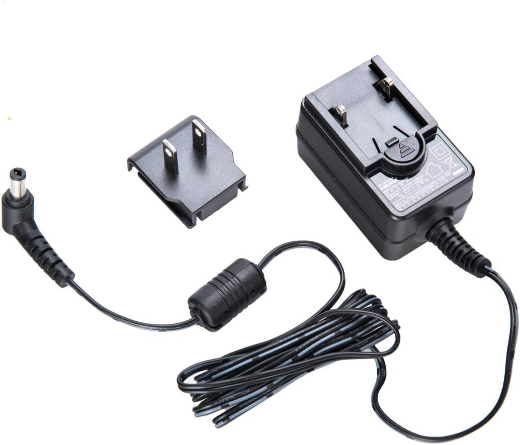 The NUX ACD-006A is a 9V 500mA DC center-negative switching power adapter designed for guitar pedals. It features low-noise, low-ripple performance, and universal 100-240V input for worldwide use. The unit includes switchable plugs for US, EU, and AU compatibility