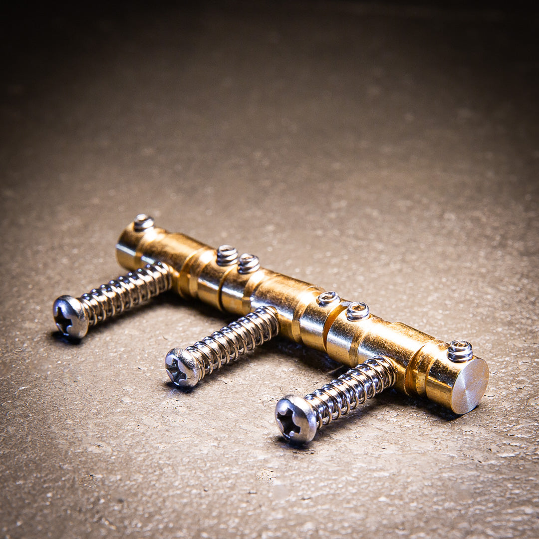 Allparts BP-2335-008 - Advanced Plating Compensated Telecaster Brass Saddles (set of 3)