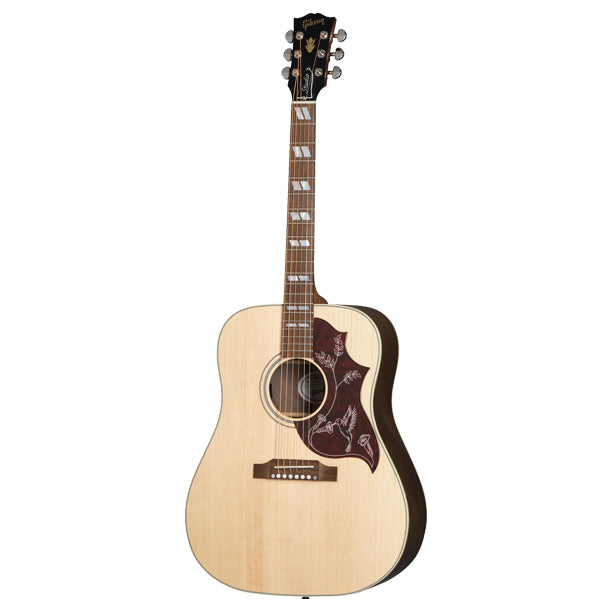 Gibson Hummingbird Studio Walnut with gloss nitrocellulose-finished Sitka spruce top, Natural finish. Square-shoulder body handcrafted in Bozeman. Gloss nitro Sitka spruce top, satin-finished walnut back and sides. Full-depth body. Advanced Response utile neck, compound dovetail joint, 24.75 in. scale. Rosewood fretboard with MOP crown inlays, 20 frets. TUSQ hardware. Grover Rotomatic tuners. Hummingbird Studio pickguard. LR Baggs Element Bronze active under-saddle pickup. Modern hardshell case included.