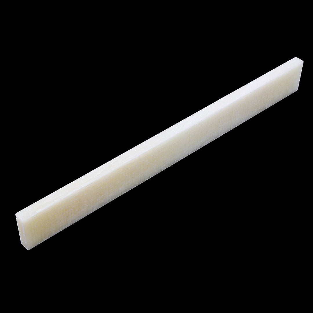 Allparts BS-2246 Unbleached Vintage-style Acoustic Bone Saddle Single item