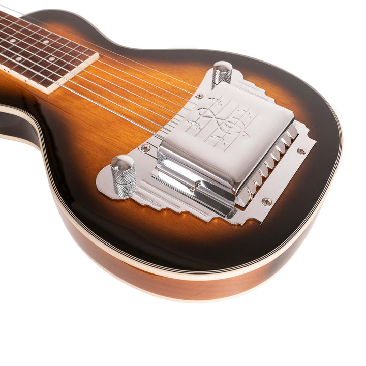 The Gold Tone LS-8 evokes the Oahu Tonemaster, one of the most revered lap steels of the 1950s. Our version is so close to the original that owners of Oahu instruments buy LS-8 pickups and hardware from us for use in the restoration of their prized guitars. The LS-8 is set up for F6 tuning (DFACDFAC) but other tunings can be accommodated by installing strings that are gauged for those tunings.
