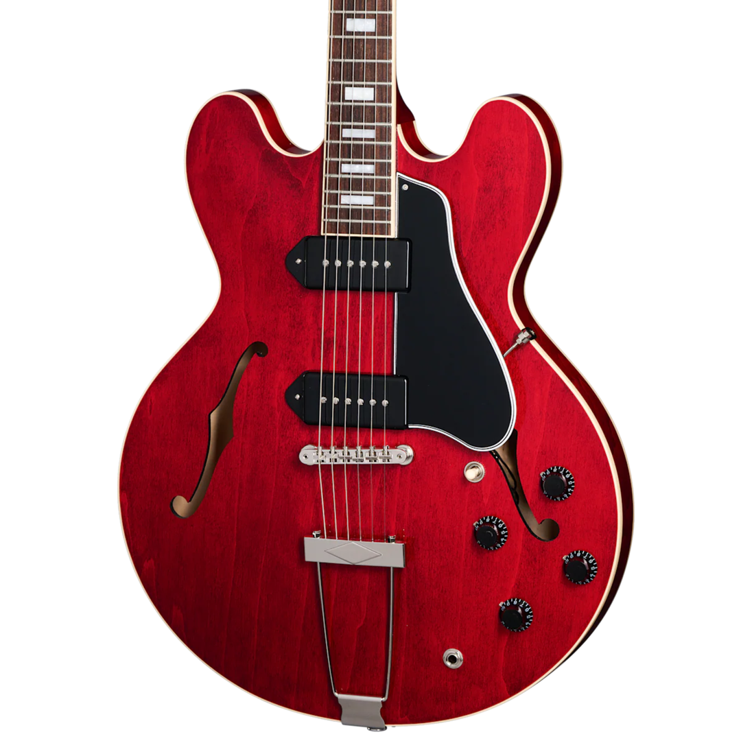 Gibson ES-330. Fully hollow thinline archtop body with no center block. Laminated maple top, back, and sides. Mahogany neck, rosewood fingerboard, 22 frets. P-90 dog-ear pickups. Trapeze tailpiece. Vintage styling. Includes hardshell case.
